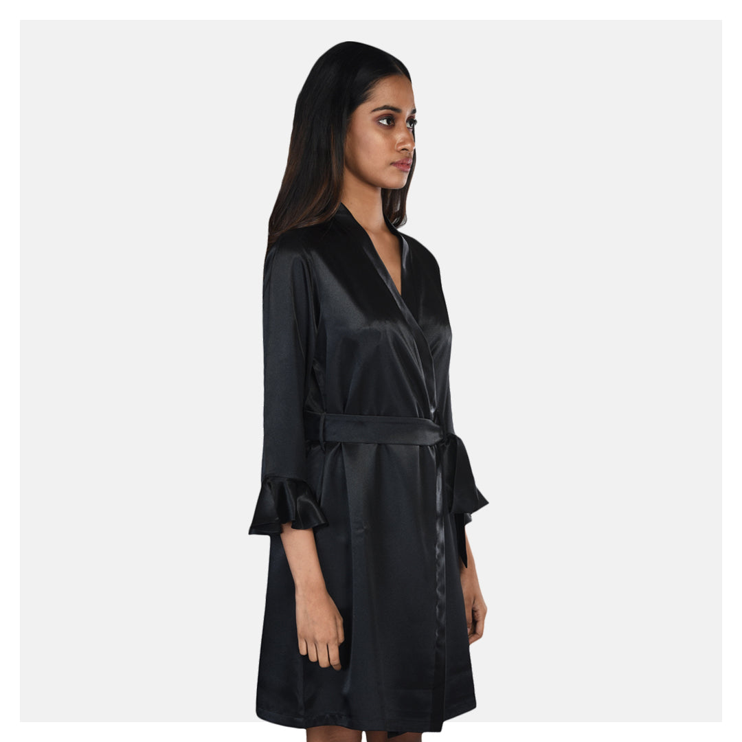 Luxorious Low Back Top and Shorts paired with a Black Gown
