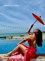 Aahnaa Sharma wearing Sangria red monokini with printed sarong styled for resort wear