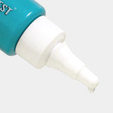 Close-up of a teal and white bottle with a nozzle on a light gray background