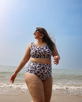 Woman in a cow print bikini