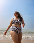 Woman in a cow print bikini