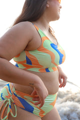 Woman wearing a colorful swimsuit