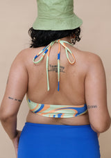 Woman wearing a colourful bikini top