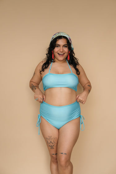 Woman wearing a blue bikini set