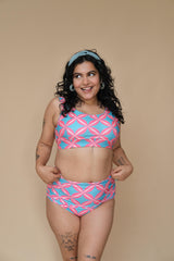 Woman wearing a pink and blue patterned bikini set