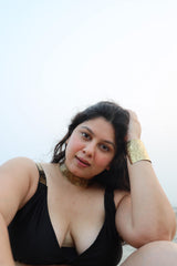 Woman wearing a black bikini top