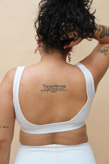 Plus size woman wearing a white top