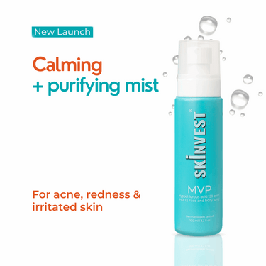 Skincare mist bottle with text on a white background