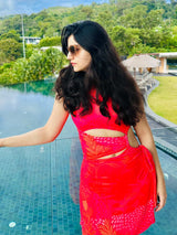 Side view of Sangria swimdress showing one shoulder design and waist cut-out