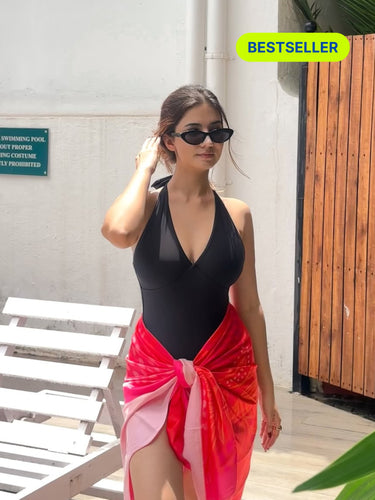 Sangria printed sarong styled as beach cover-up with swimsuit – women’s resortwear