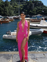 Hot pink starfish monokini with matching skirt near water