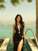 Plunging black monokini with matching skirt for swimwear styling