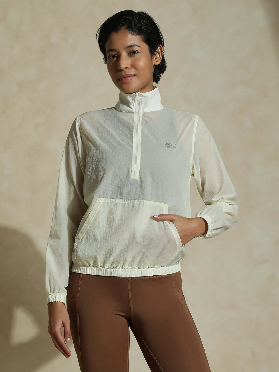 Shop-TraqLite Half Zip Performance Jacket Ecru