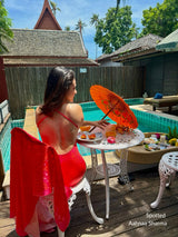 Aahnaa Sharma wearing Covera Bestseller printed monokini with matching sarong worn on vacation