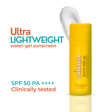 Yellow bottle of sunscreen with white cap on a white background
