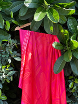 Lightweight printed sarong draped open for styling – women’s resortwear