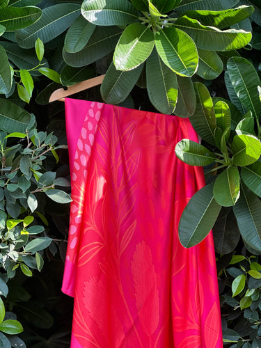 Lightweight printed sarong draped open for styling – women’s resortwear