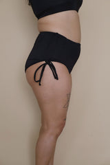 Black shorts worn by a Plus size woman