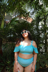 Woman in a blue bikini set
