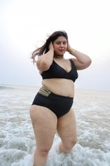 Woman in a black swimsuit 