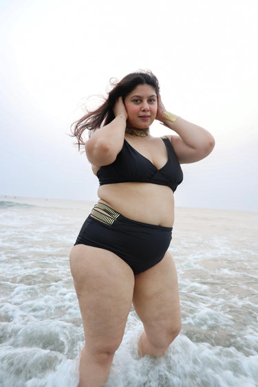 Woman in a black swimsuit 