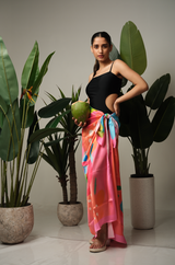 Lightweight tropical sarong draped open for styling – women’s resortwear