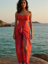 Matching sarong styled over monokini for beach look.
