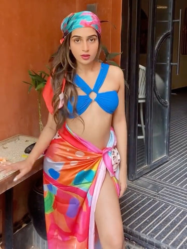 Multicolor printed sarong worn as skirt styling – women’s resortwear