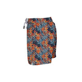 House of Malabaar boy's swim shorts with a fall foliage print.