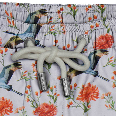 House of Malabaar boy's swim shorts with flying crane print.