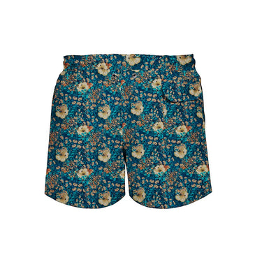 House of Malabaar boy's swim shorts with tropical leaves and hibiscus flowers.