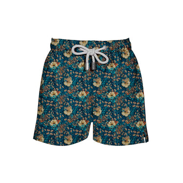 House of Malabaar boy's swim shorts with tropical leaves and hibiscus flowers.