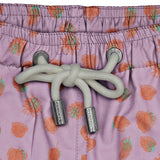 House of Malabaar pink boy's swim shorts with playful print of tropical leaves.