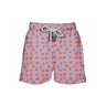 House of Malabaar pink boy's swim shorts with playful print of tropical leaves.
