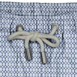 House of Malabaar boy's abstract wave print swim shorts.