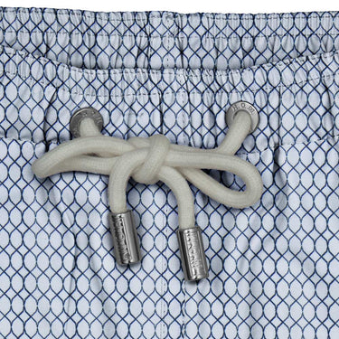 House of Malabaar boy's abstract wave print swim shorts.